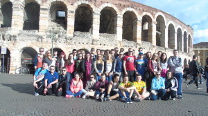 The tour group pictured outside the Roman Arena in Verona
